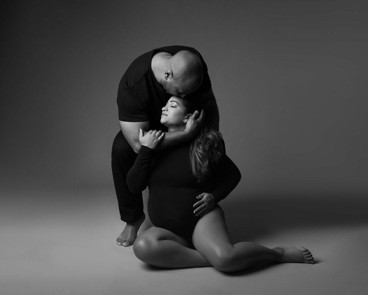 Black and white couple m aternity portrait by Daisy Rey in new Jersey