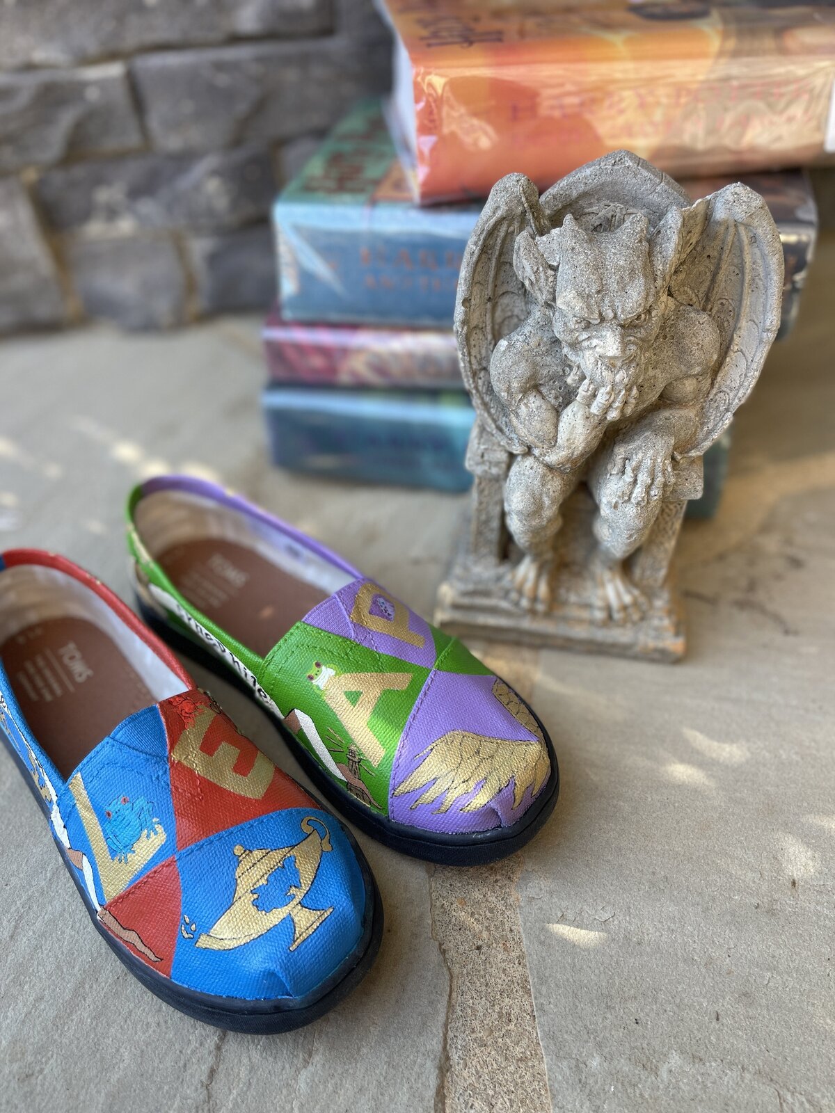 Toms custom painted for a giveaway at a local elementary school. The theme is LEAP and the school calls themselves Scroggwarts as a twist on Hoggwarts, using symbolic imagery and colors for each grade.