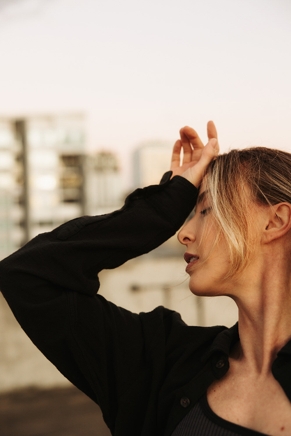 Content creator dancing on rooftop on the Sunshine Coast by brand photographer