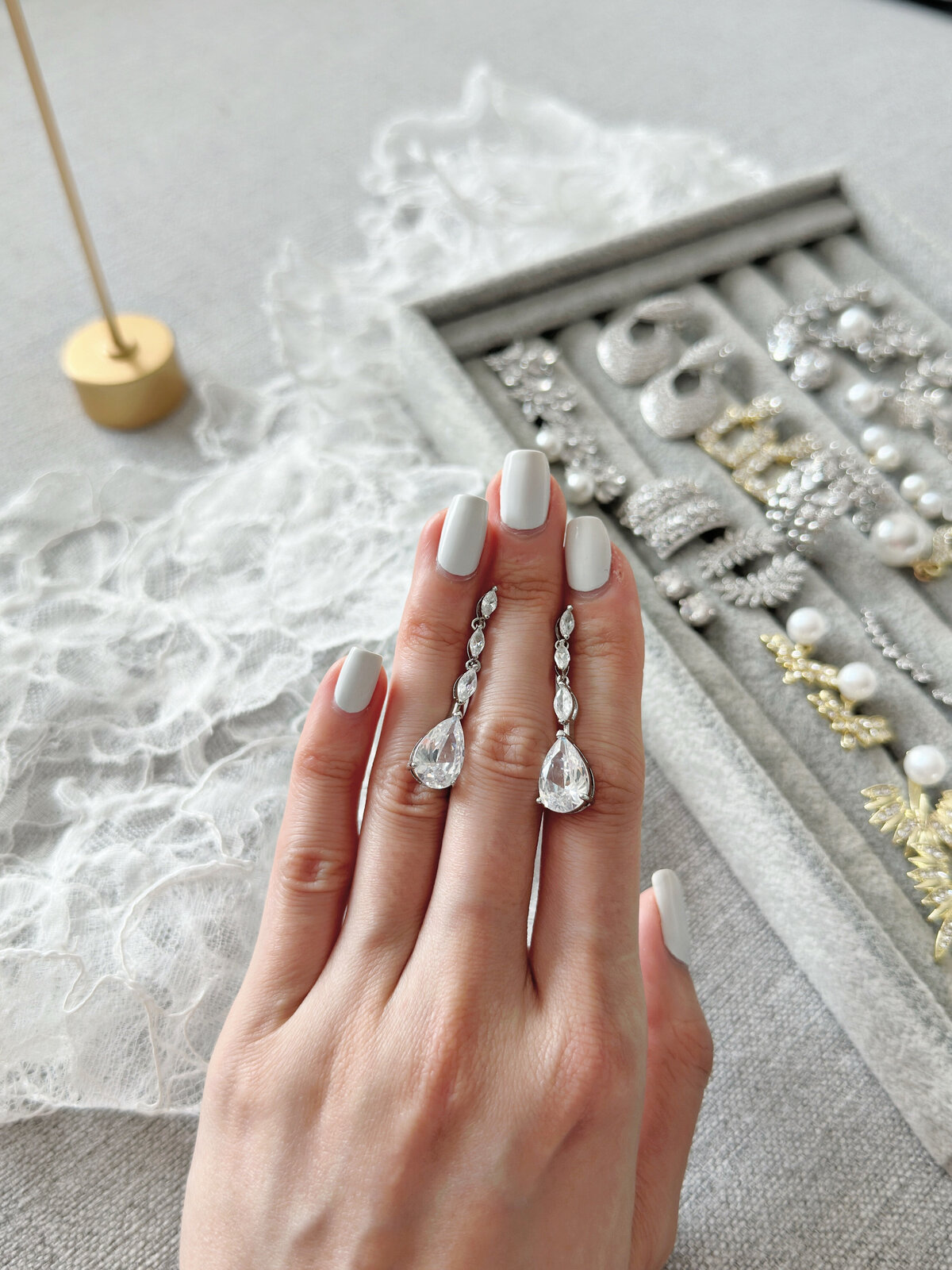 Bride wearing handmade crystal and pearl necklace for elegant look
