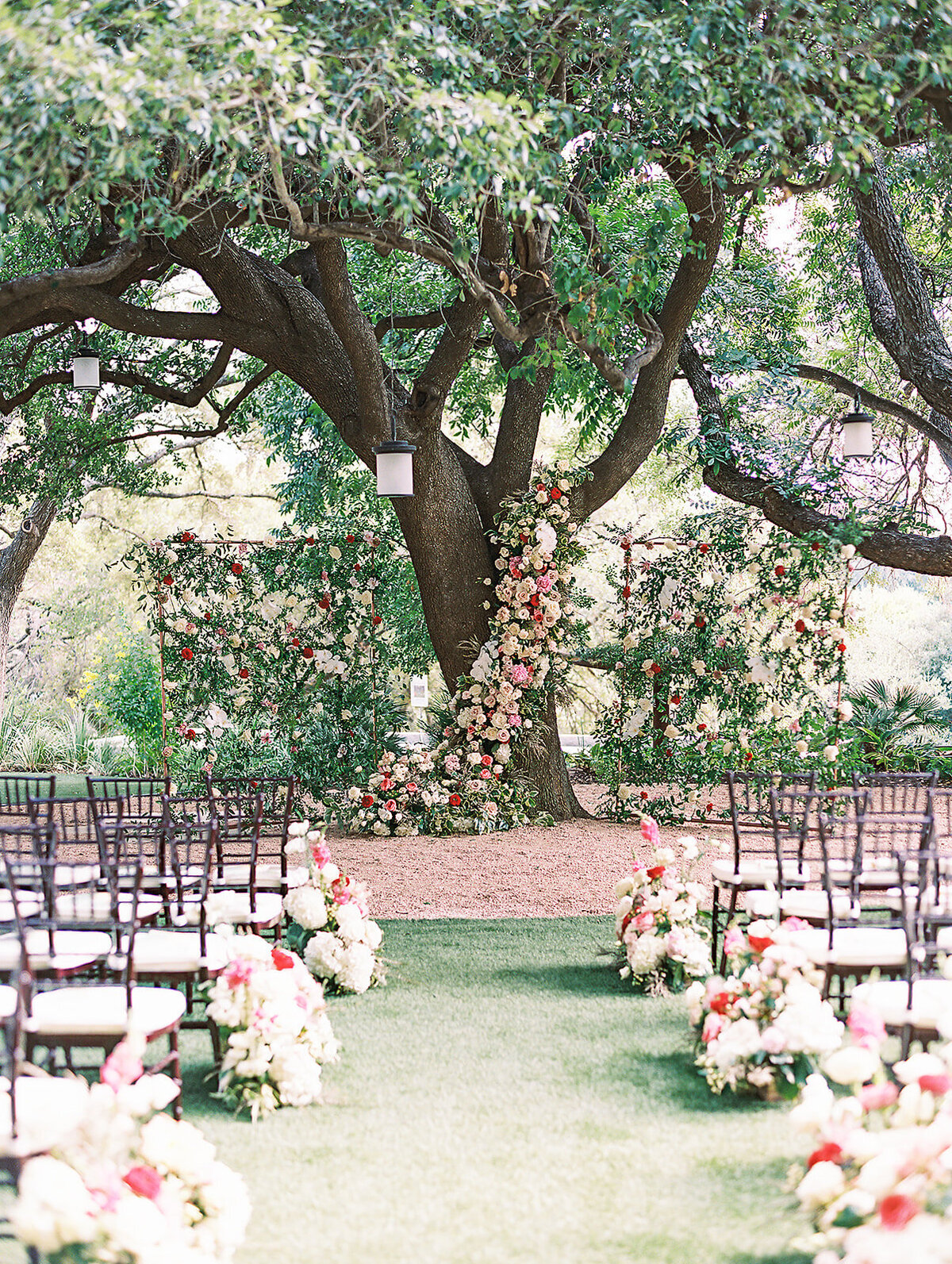 An extravagantly flowered ceremony under the Oak Tree at the Four Seasons in Austin