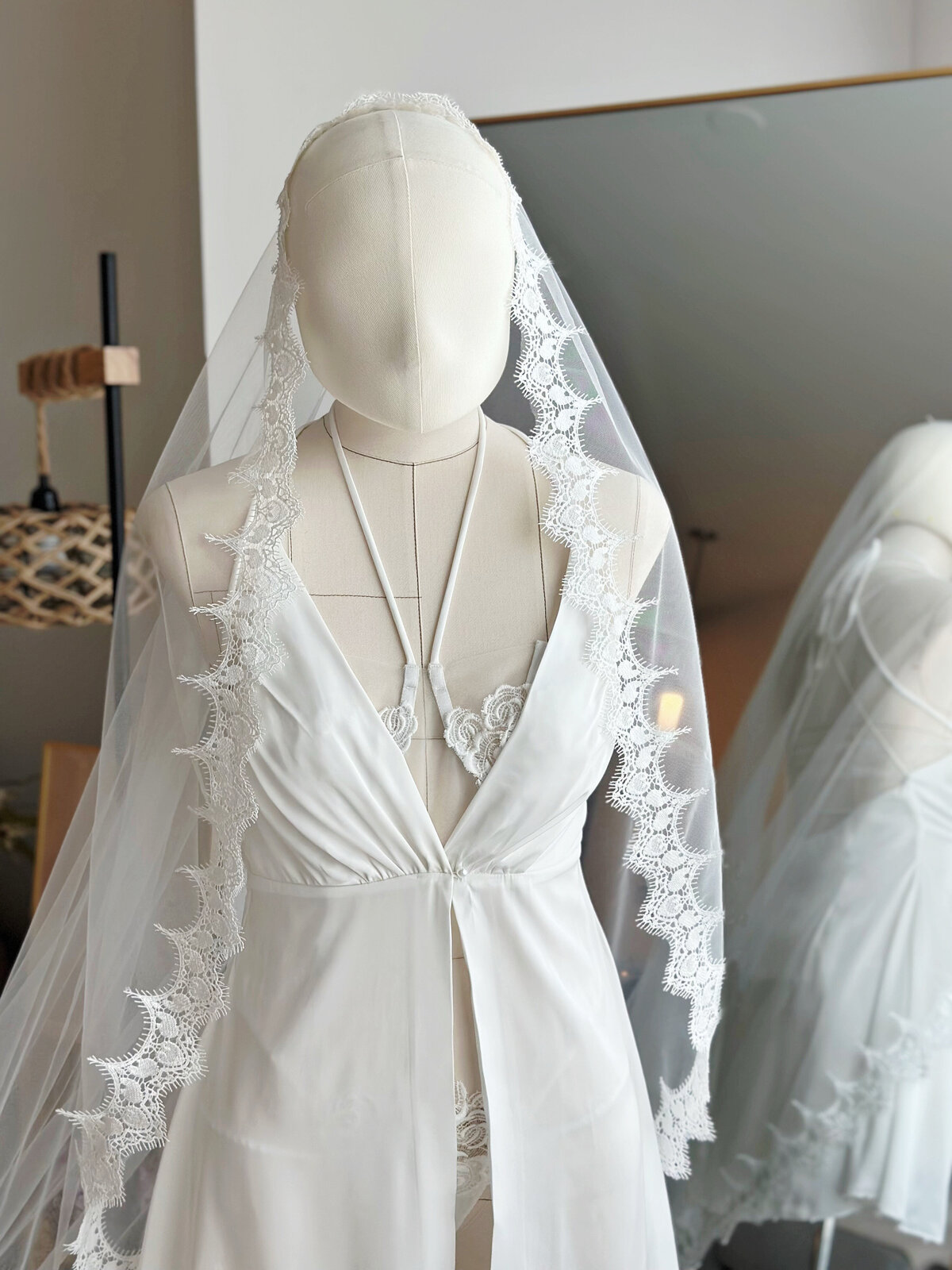 Traditional Spanish-inspired mantilla veil with floral lace embroidery