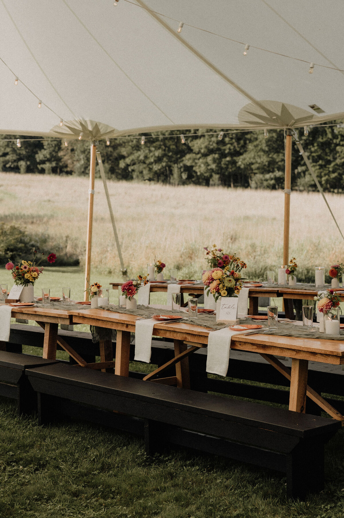 Outdoor tablescape with florals for Maine reception