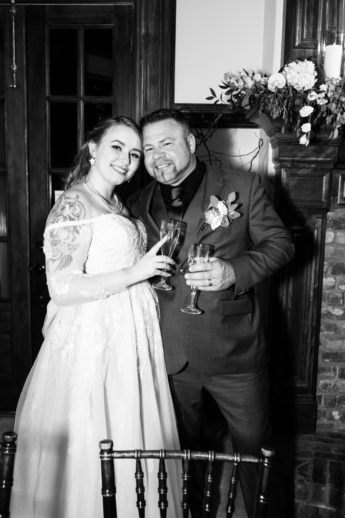 Carl-House-Wedding-Bride-and-Groom-Toasts-Champagne