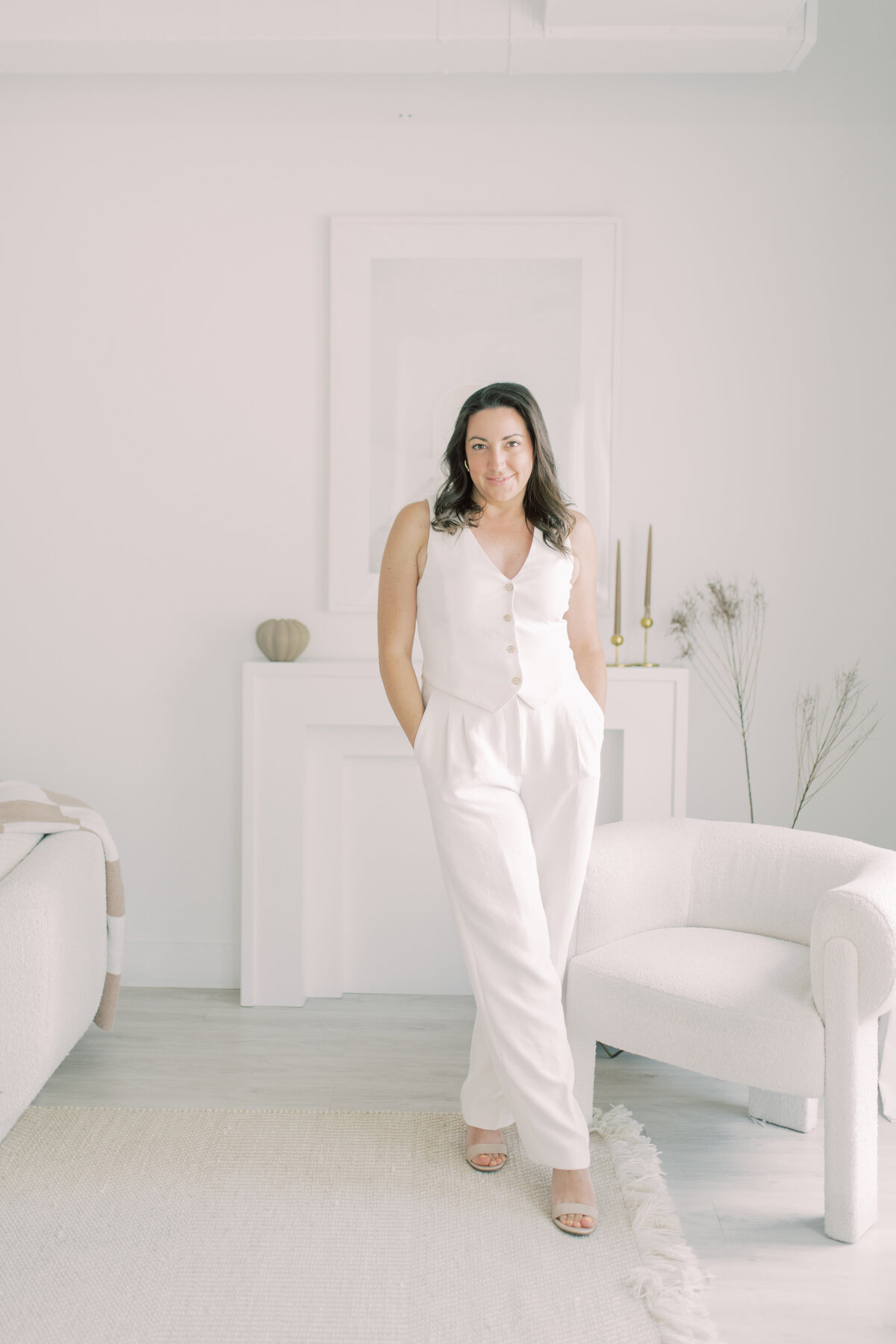 Standing shot of girl in white outfit old money style