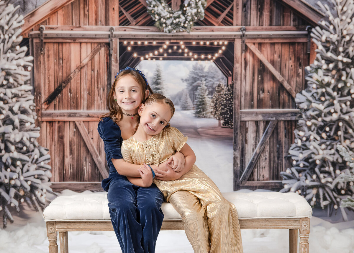 Holiday portrait of relaxed and happy siblings at Allison Reilly's Union County, NJ photo studio.