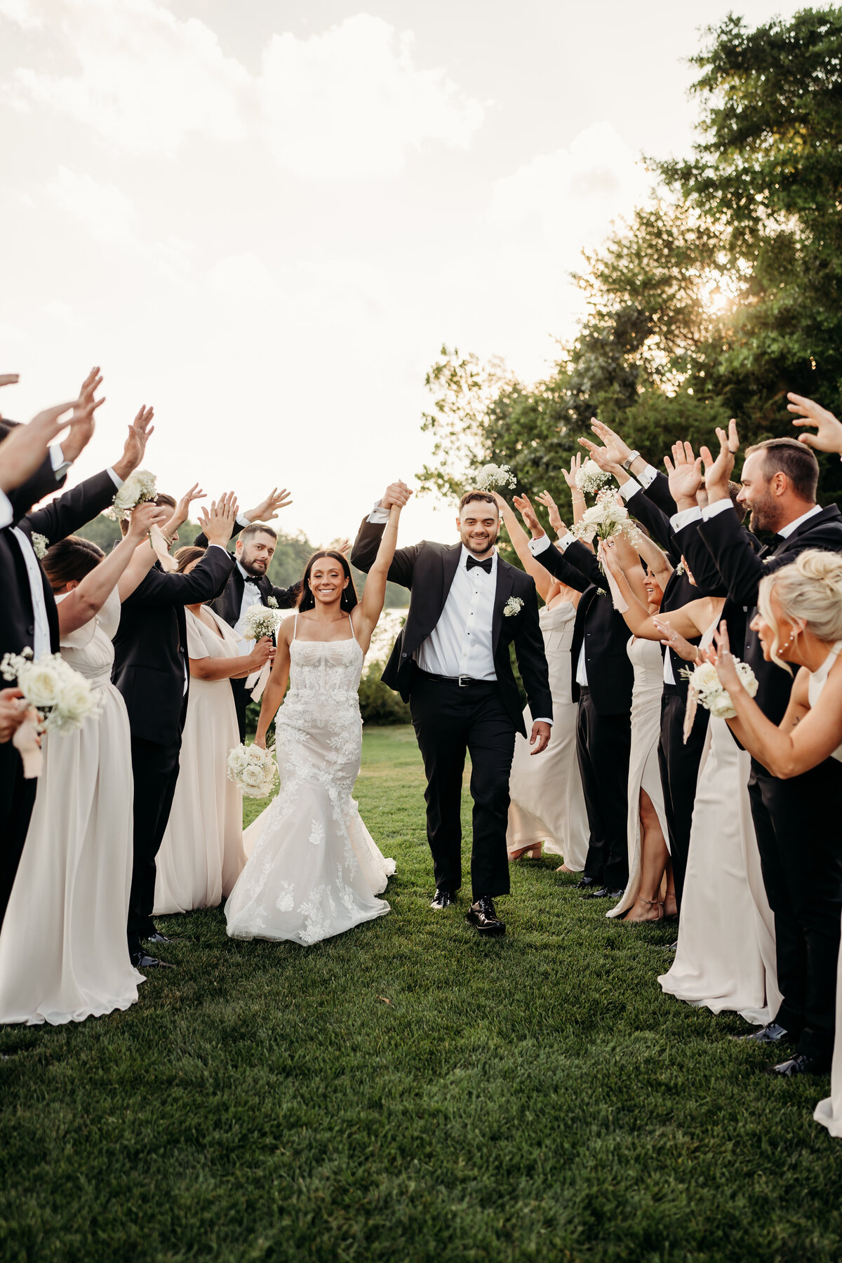 Bride and Groom celebrate with friends and family after they tie the knot. Boston Area wedding with Saphire Event Group, The Lakhouse, Halifax Ma