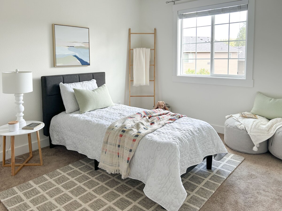 occupied-home-staging-bothwell-condo-guest-bedroom-modernmollusk