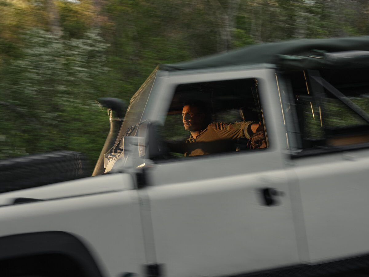 A man driving in a truck