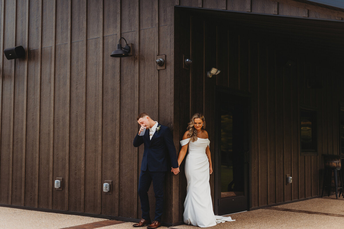 Emotional First Touch wedding photo