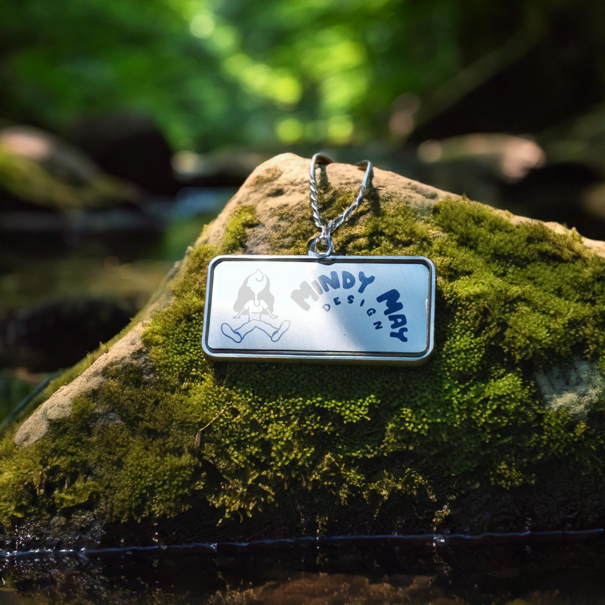engraved-metal-keyring-rectangle-on-a-rock