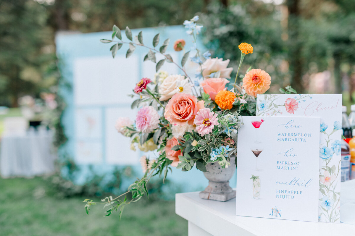 outdoor-cocktail-hour-summer-wedding-sign