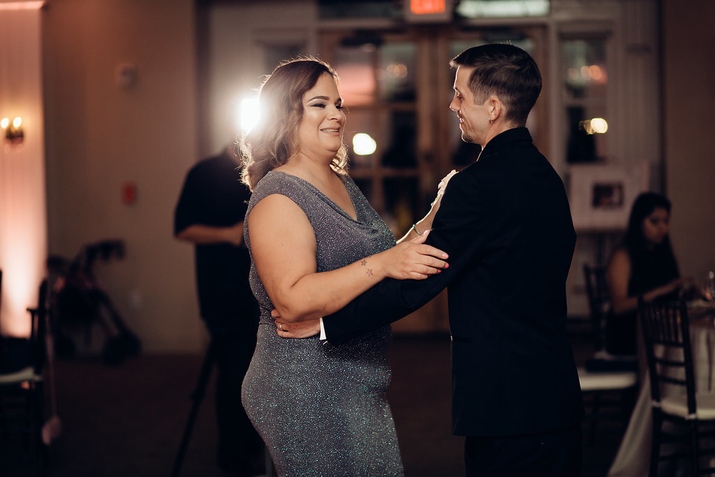Wedding Photograph Of Woman In Gray Dress Dancing With The Groom Los Angeles