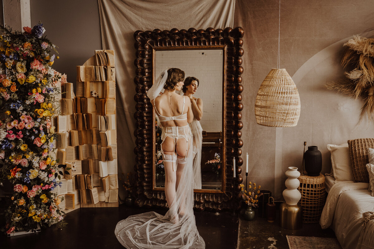 mirror-reflection-bridal-boudoir-books-flowers-the-storyteller-studio-des-moines-storyteller-collective-photo-co
