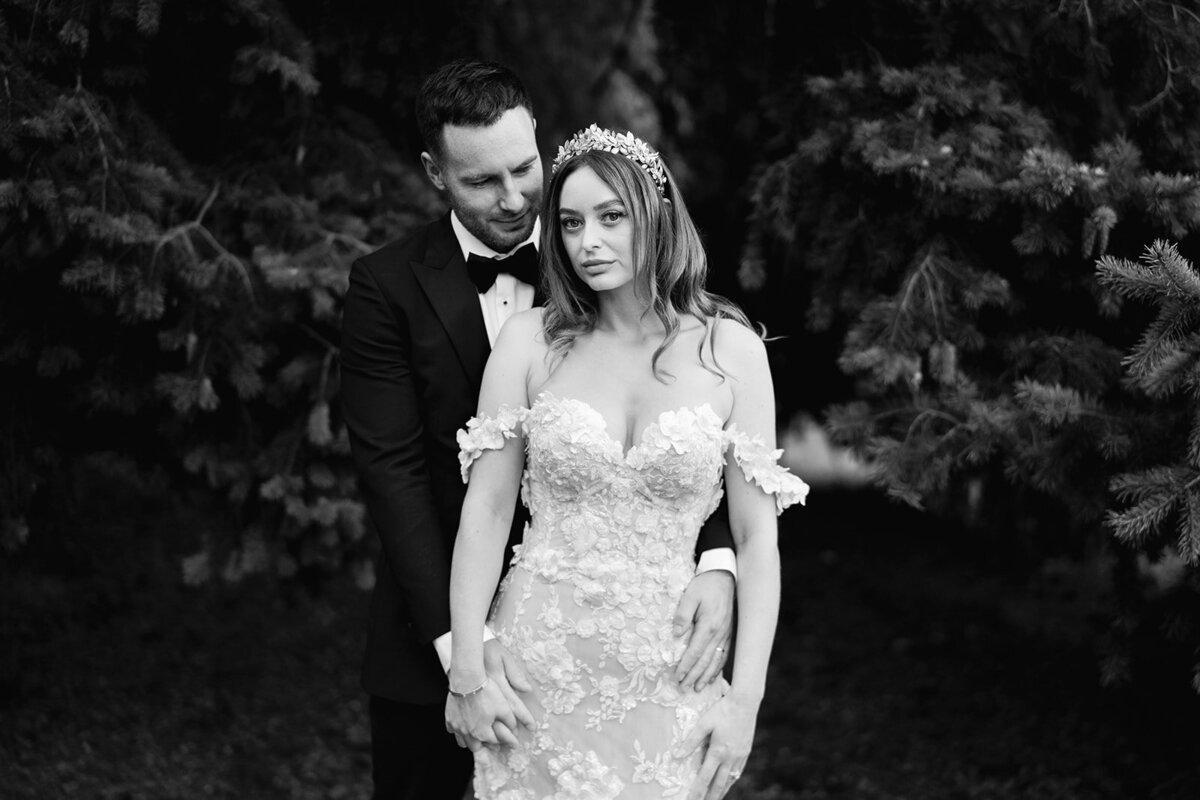 black and white photo of couple on their wedding day at delamere manor