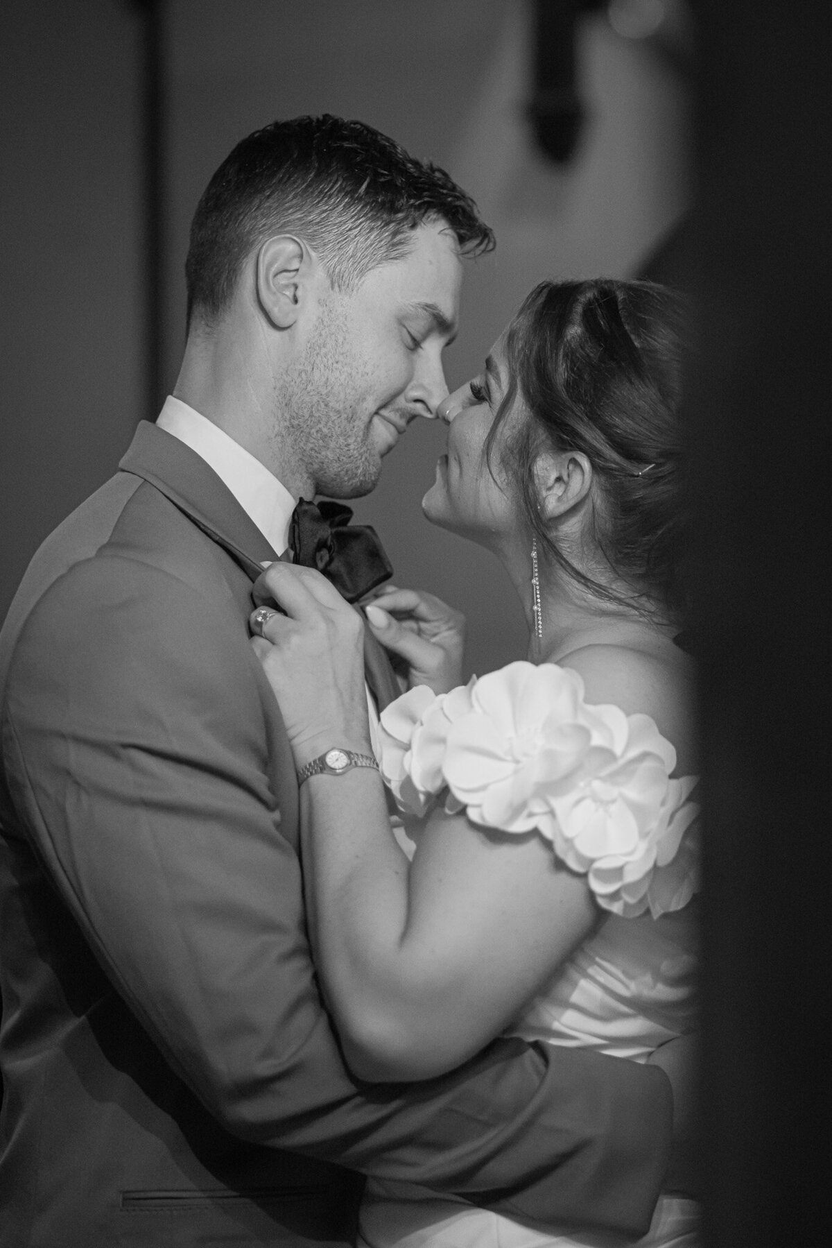 Bride and Groom touching noses