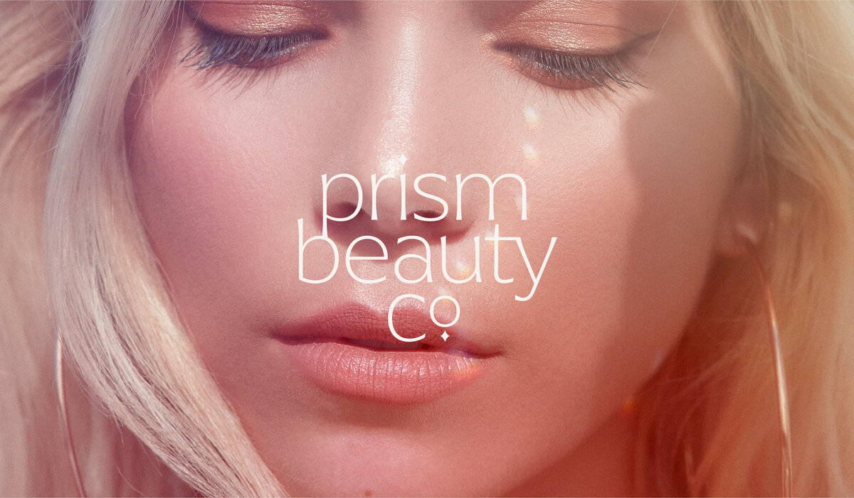 Prism Beauty Co. Primary Logo on Image of GIrl in glowy makeup