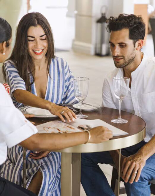 couple sitting at table planning