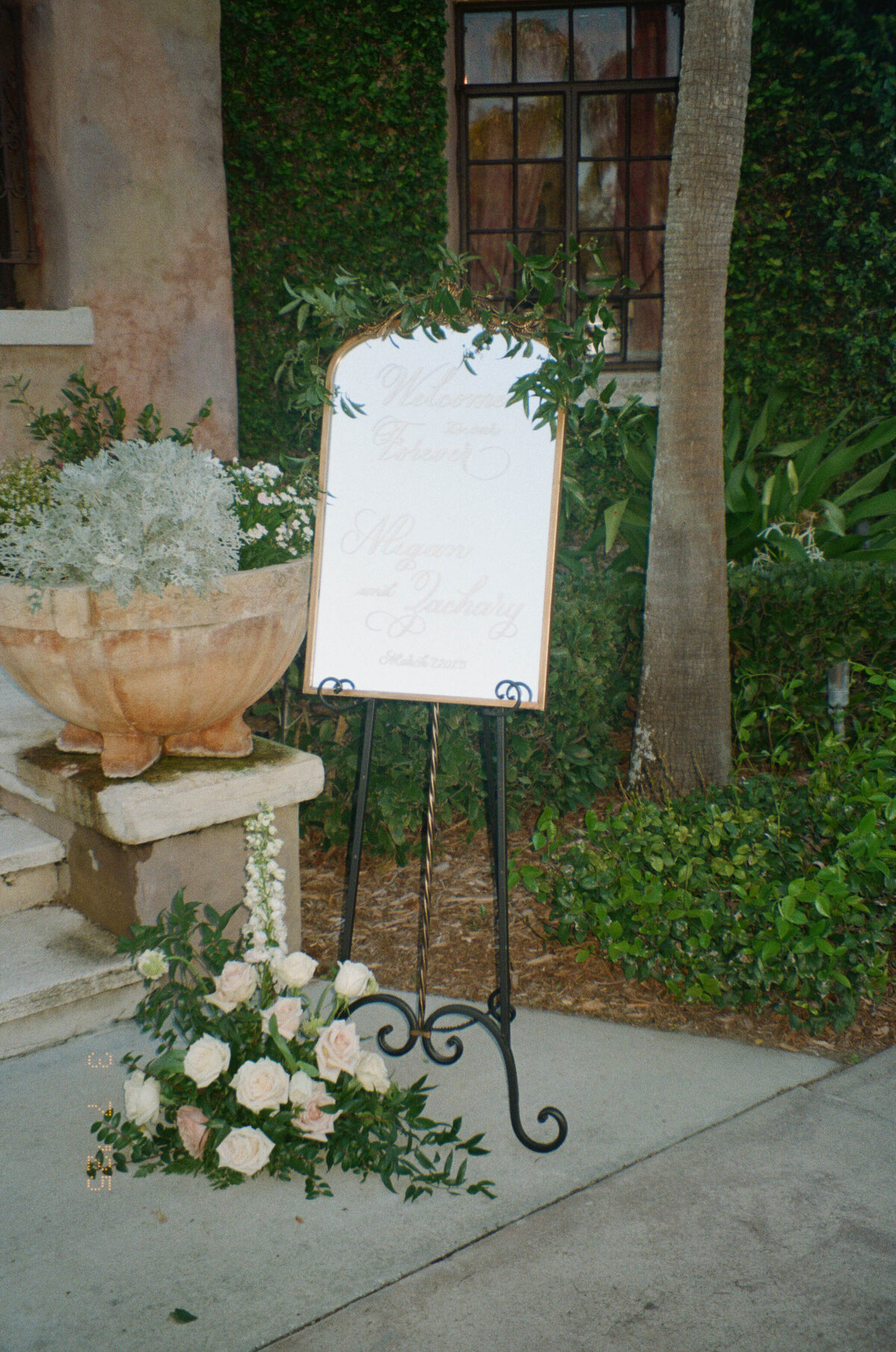Medium arch mirror with ornate ornament on top with calligraphy for welcome sign