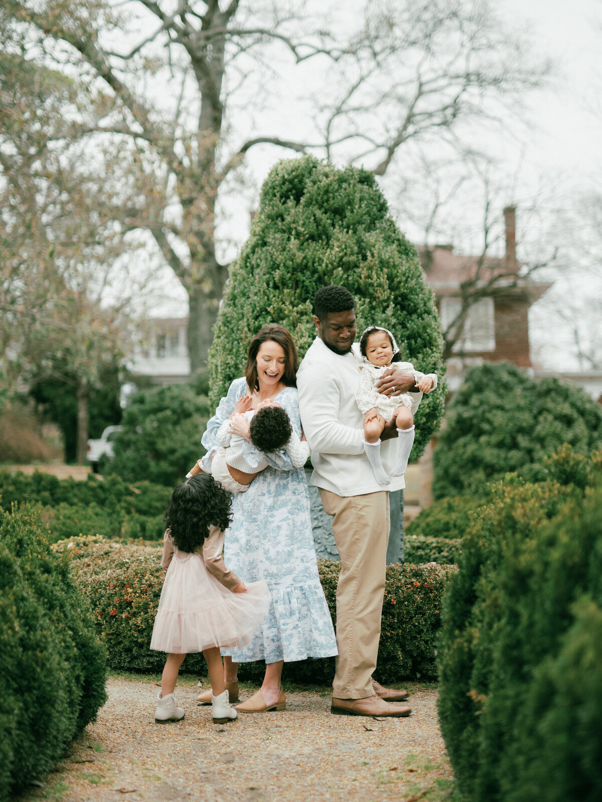family posed in garden from huntsville photographers fauna & film