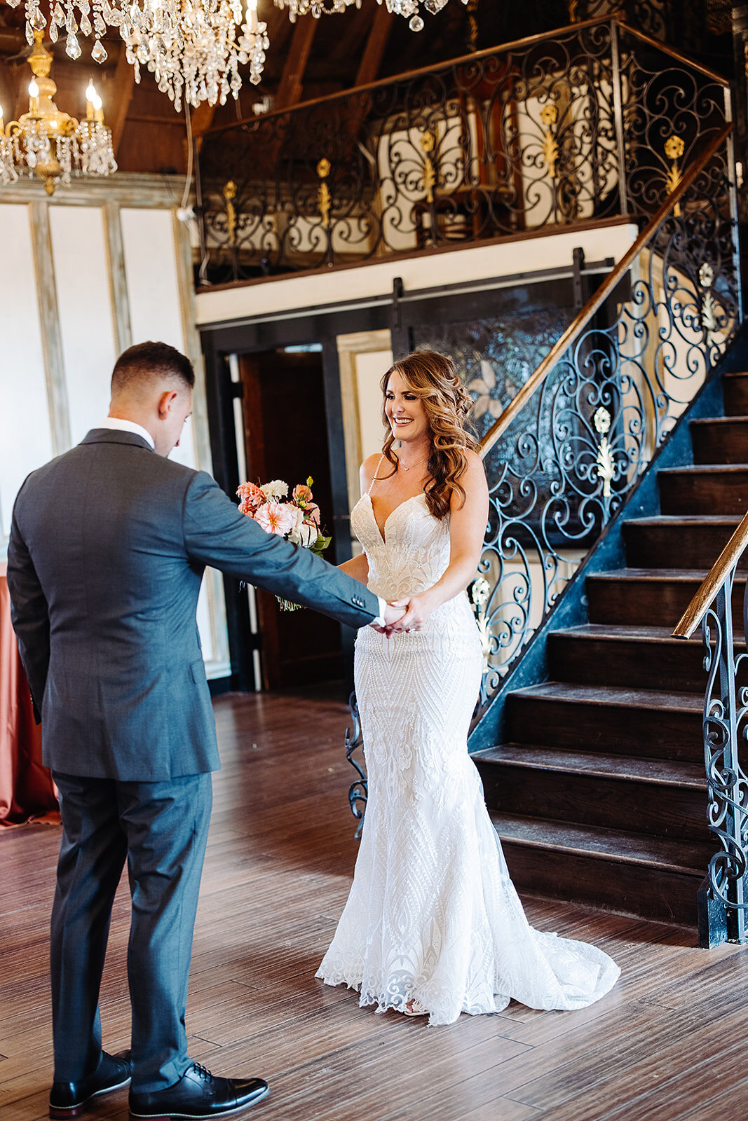 Groom sees his bride for the first time on their wedding day.