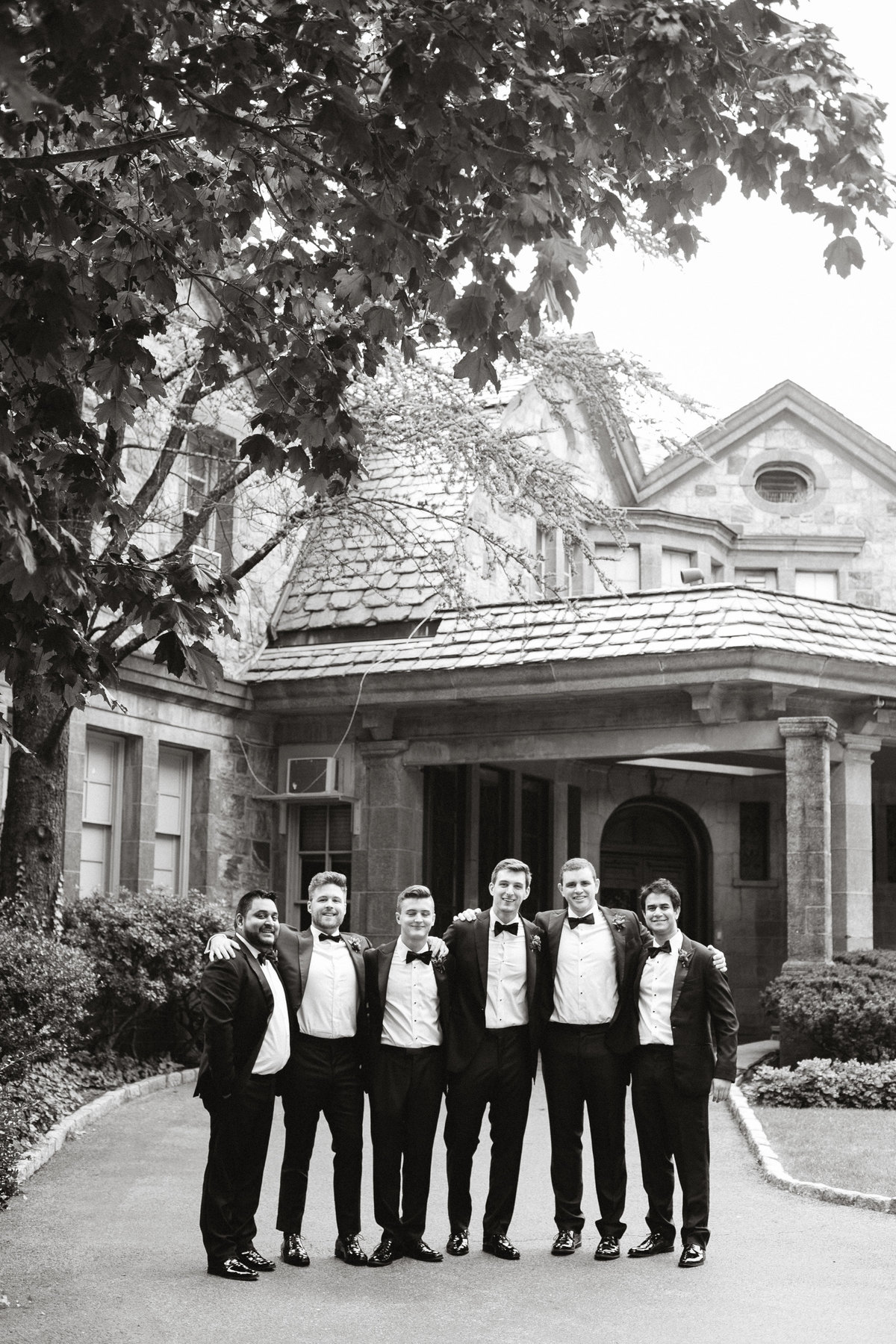 Groom and his guys photographed outside the beautiful wedding venue at Tappan Hill Mansion.