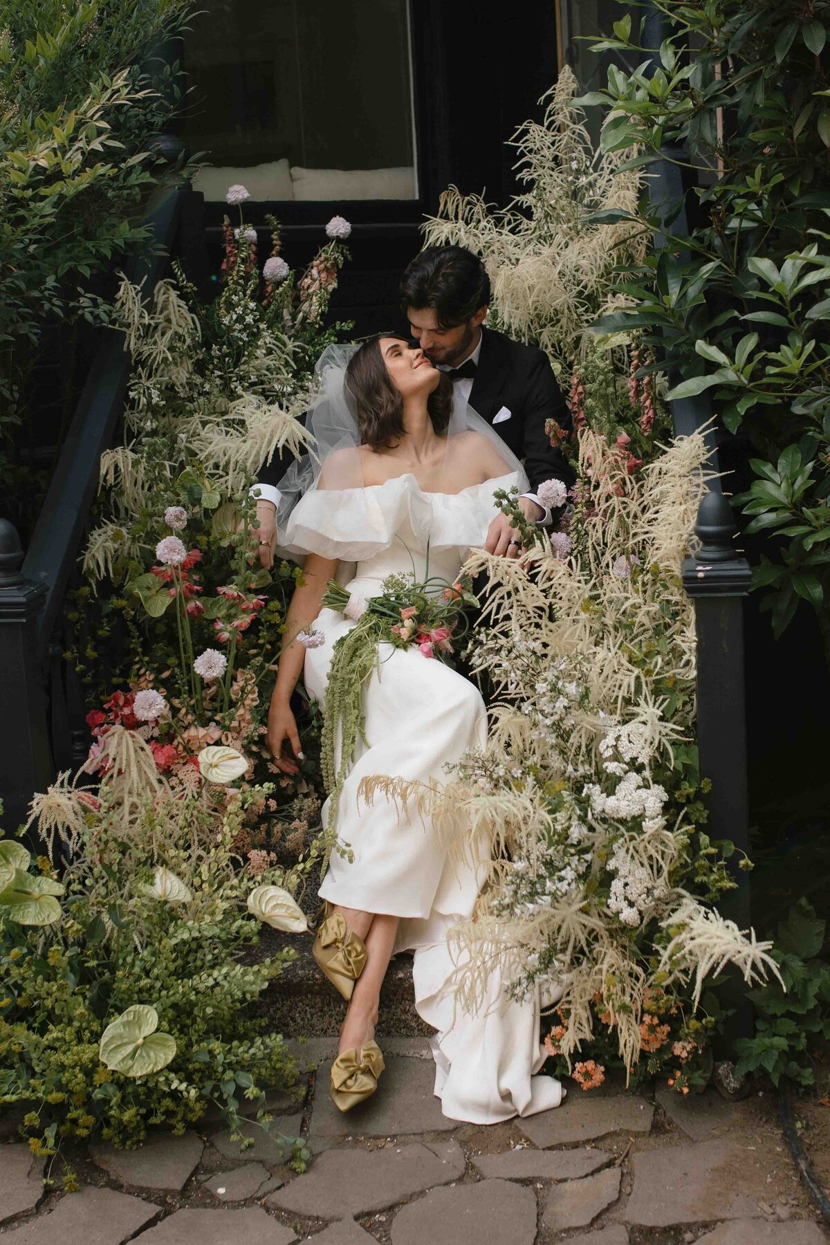 Wedding portraits with dramantic florals