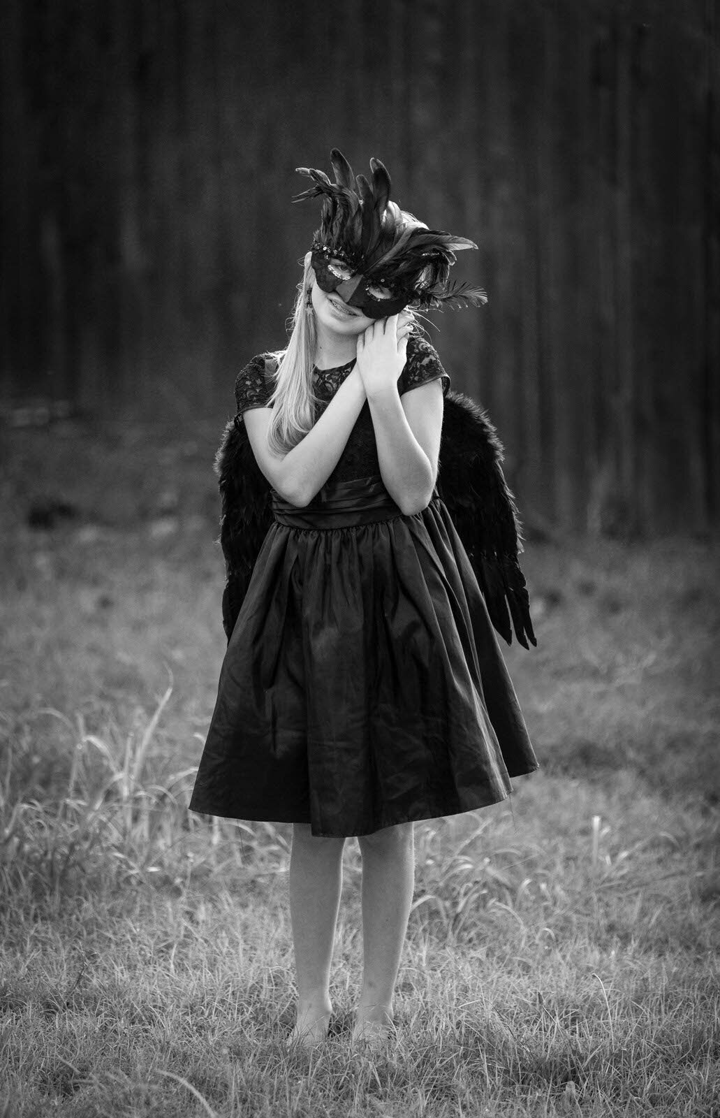 black-and-white-photograph-of-girl-in-raven-costume