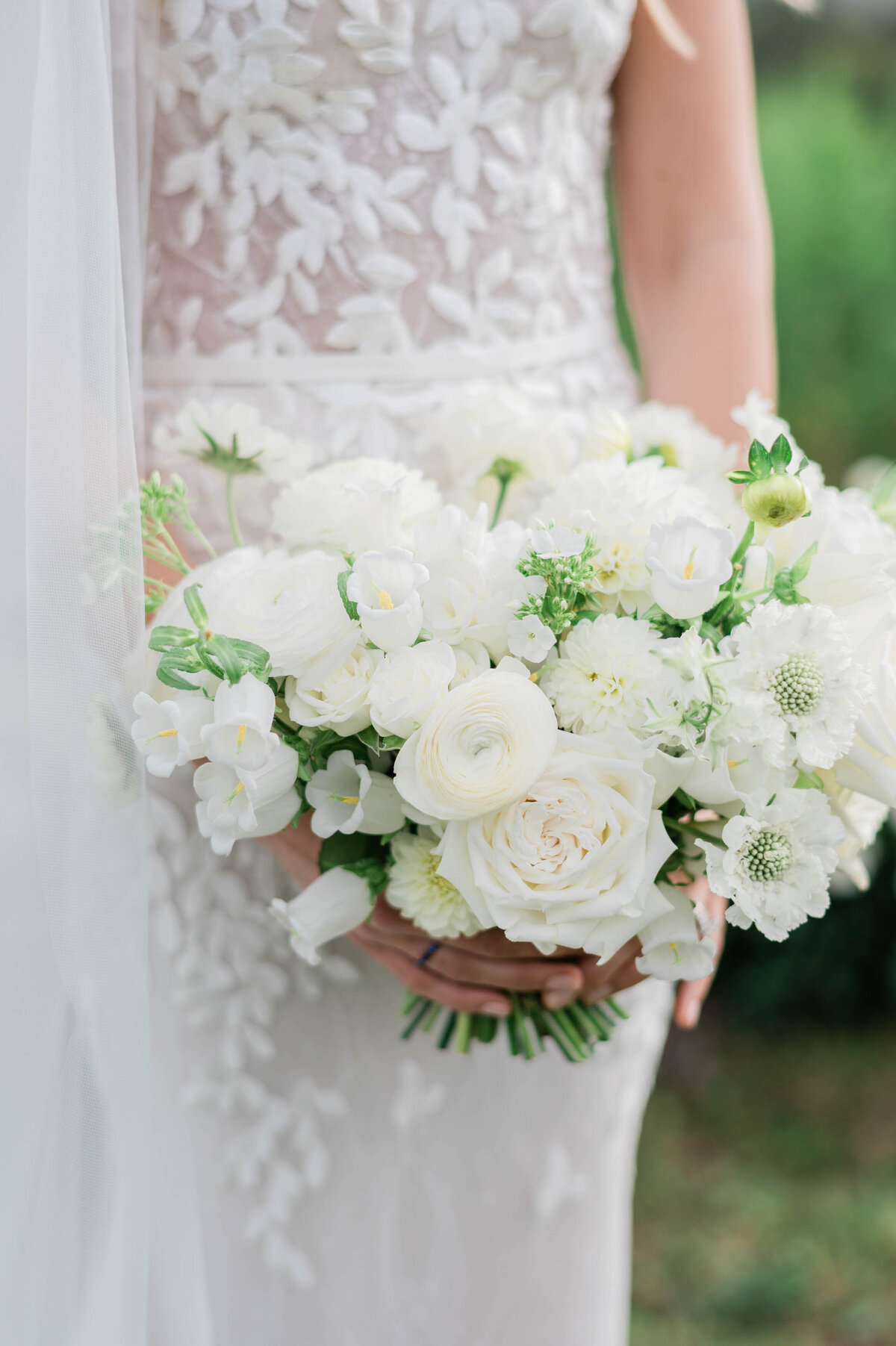 Bride's big and white wedding bouquet
