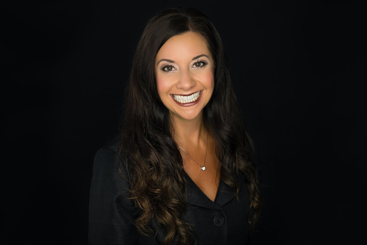 professional-woman-headshot-dark-background-5
