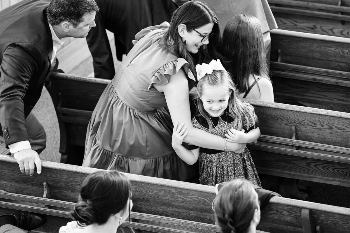 Wedding guests taking seats at Big Sky Chapel, Big Sky, MT