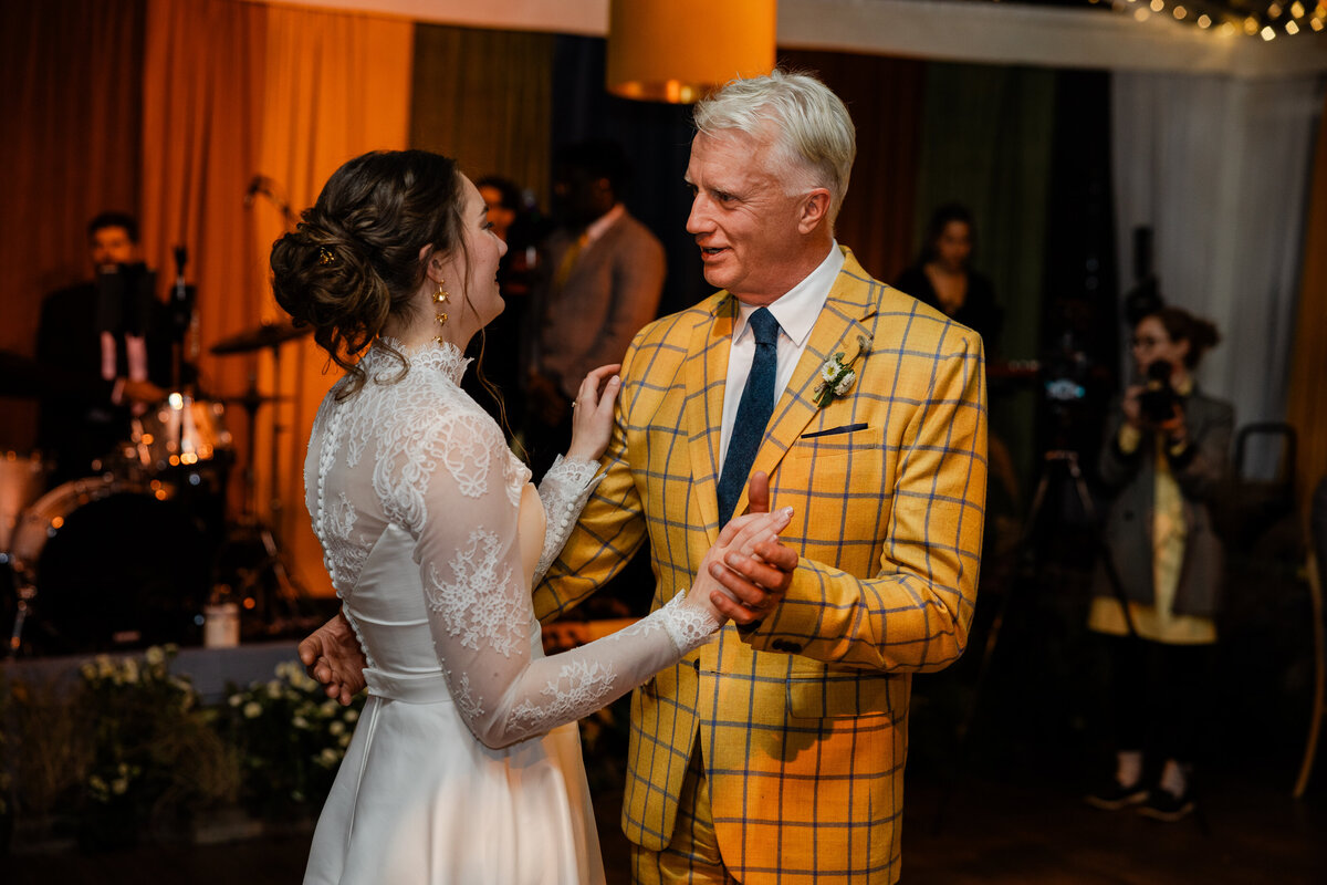Picture of a bride and her father dancing at her wedding.