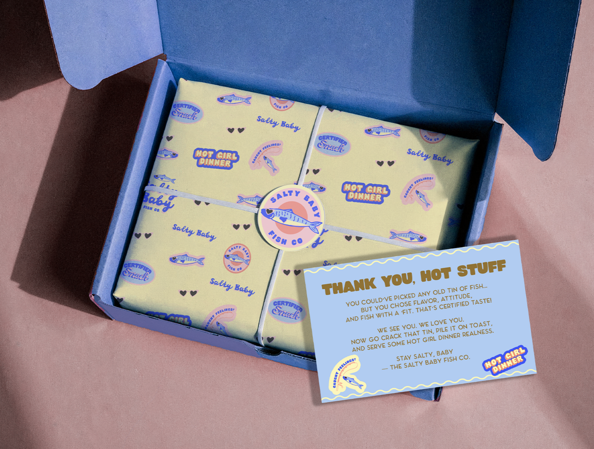 Salty Baby’s food & beverage branding, including logo and packaging, combines bold, playful design with strategic messaging to help boutique tinned fish brands communicate a memorable, professional, and approachable identity.

Wildspark crafted Salty Baby’s logo, packaging, and brand identity for women-led food & beverage brands, delivering vibrant, bold, and cohesive CPG branding that attracts consumers and drives retail success.