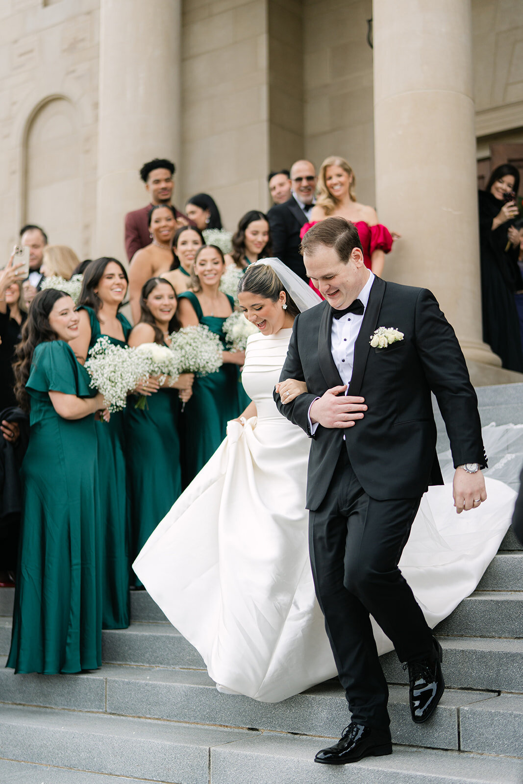 Bride and groom leaving Cathedral of the Most Sacred Heart of Jesus in Tennessee
