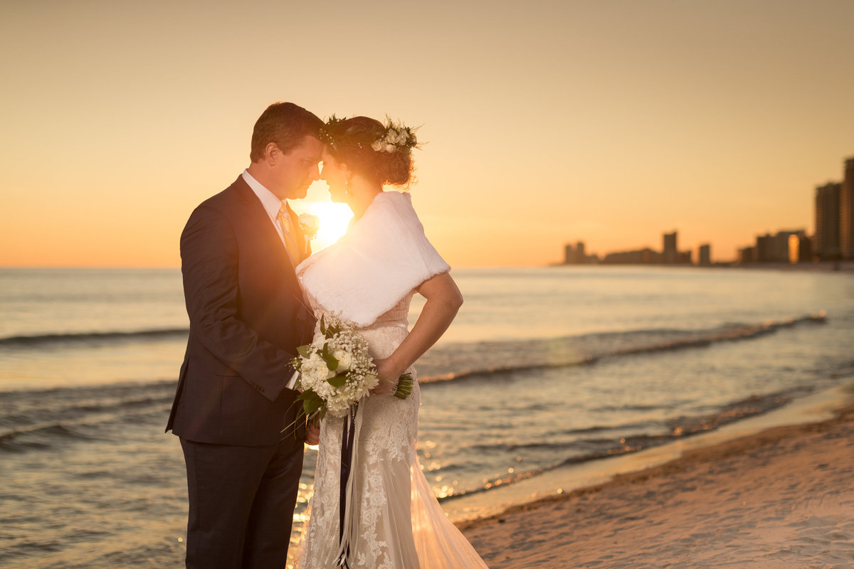 Ashley & Patrick Graves' bride and groom photos at sunset on the beach.  Taken at The Perdido Beach Resort in Orange Beach, Alabama.