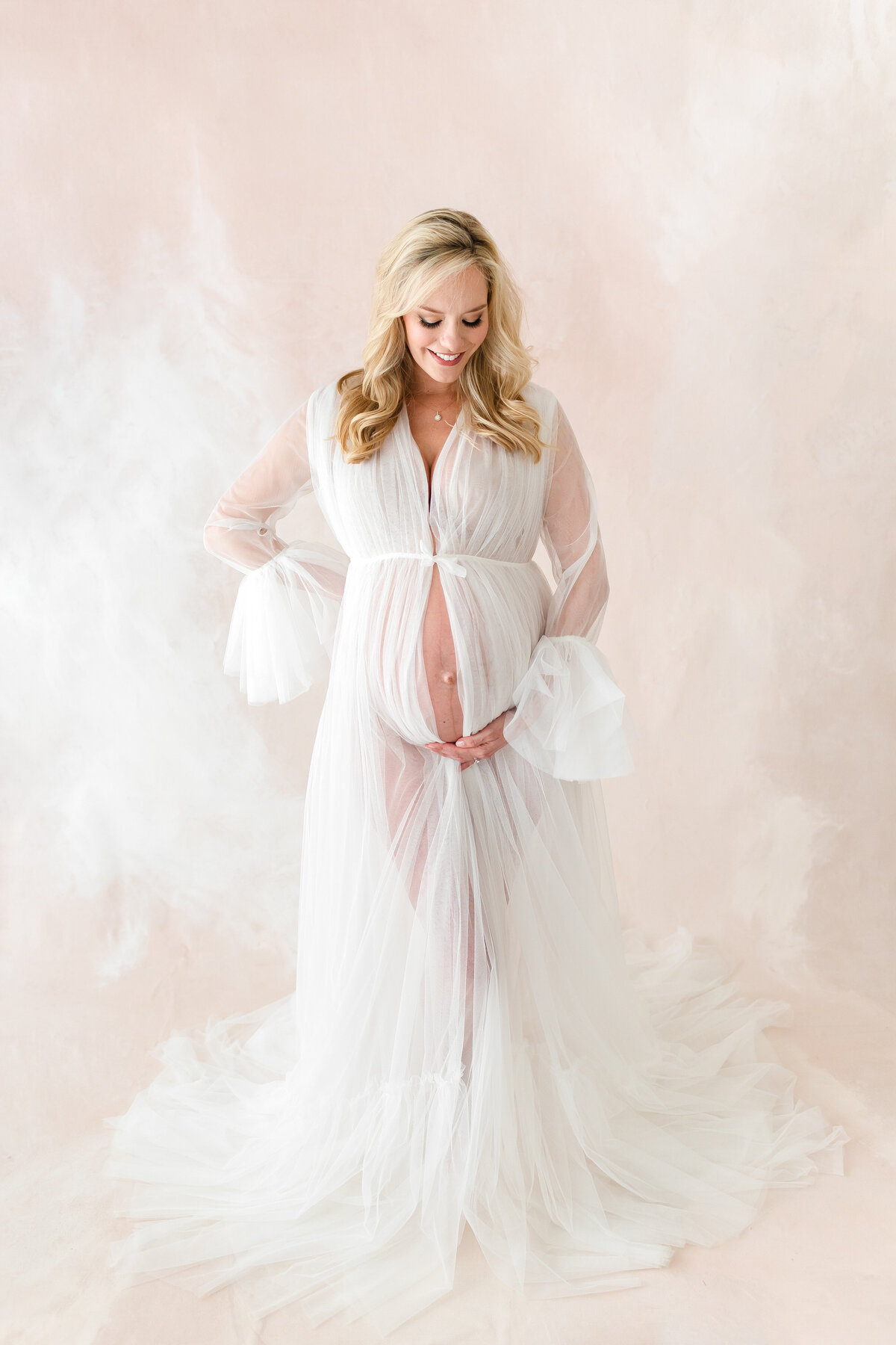 A stunning boudoir DC Maternity Photographer photo in our Warrenton studio