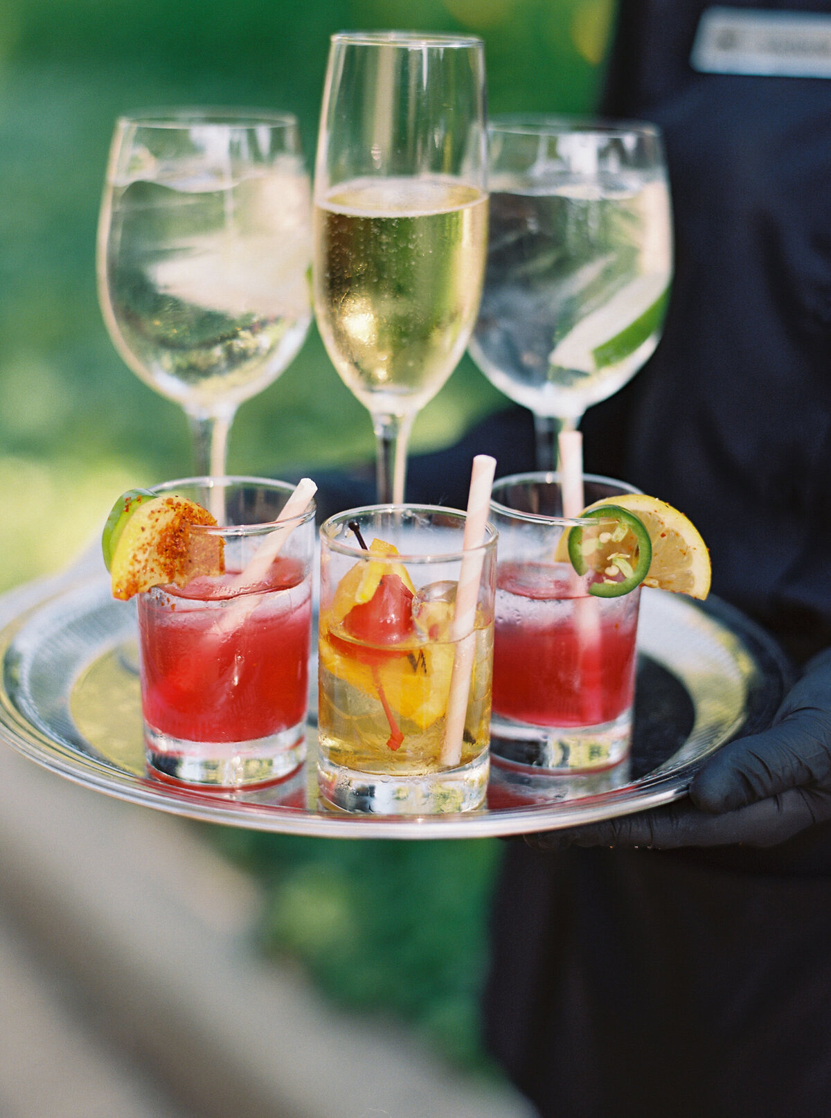 Refreshing cocktails served on a tray, adding a touch of elegance.