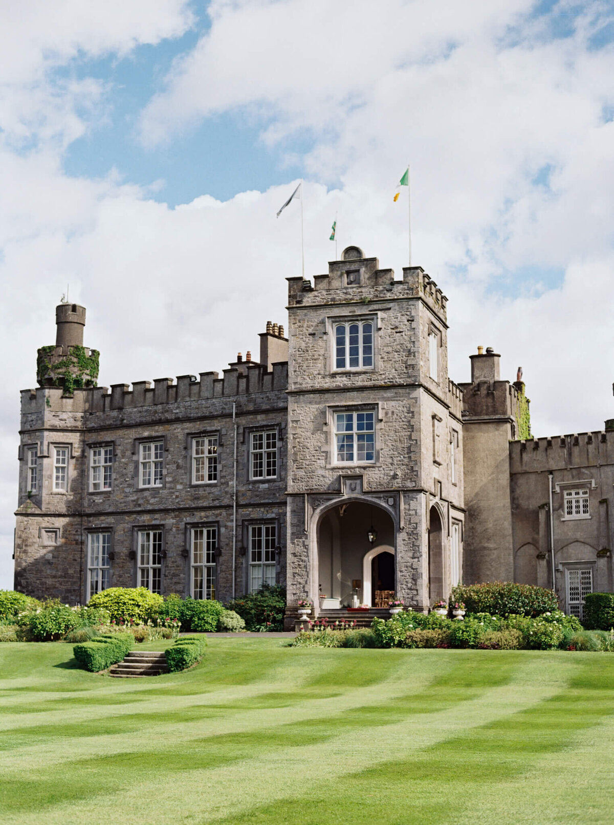 a wedding photo showing Luttrellstown Castle in Ireland
