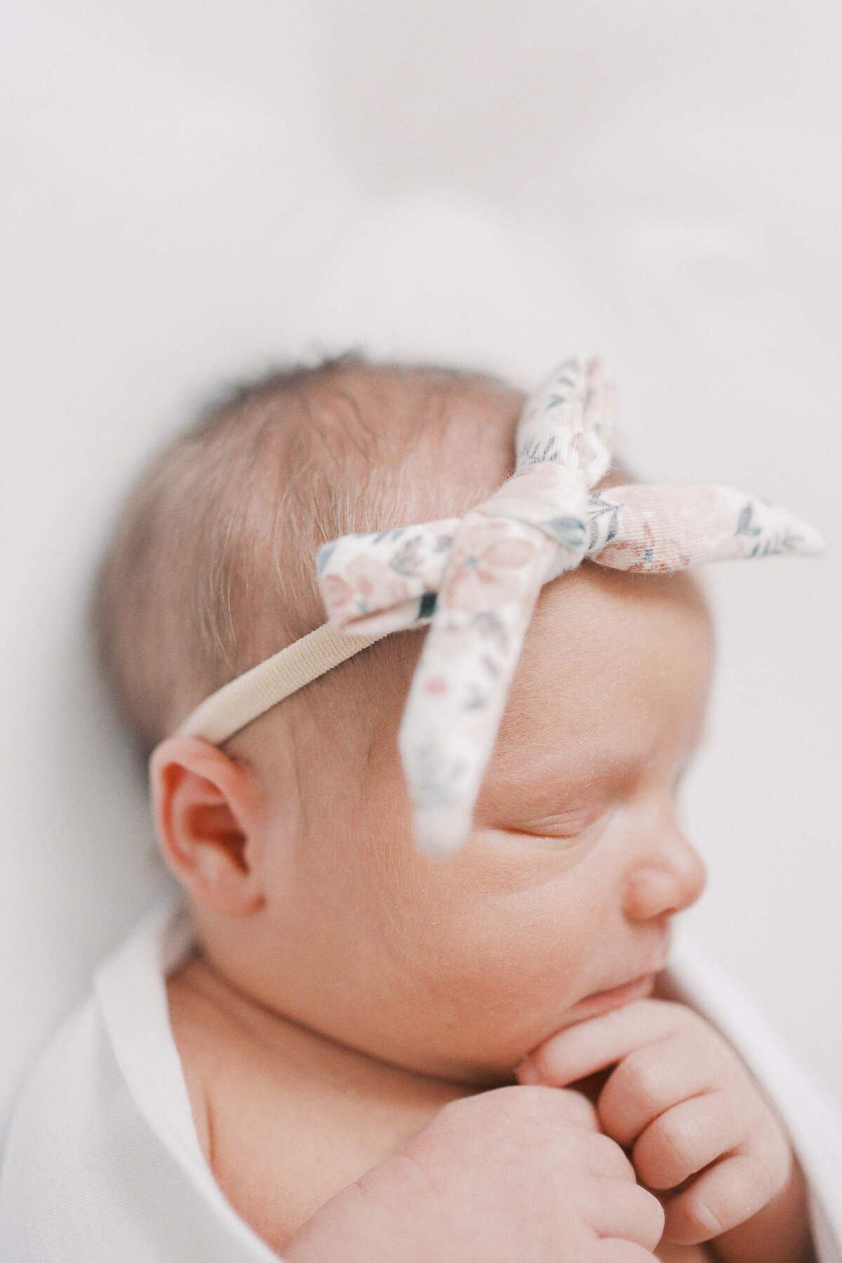 close up photo of baby girls head