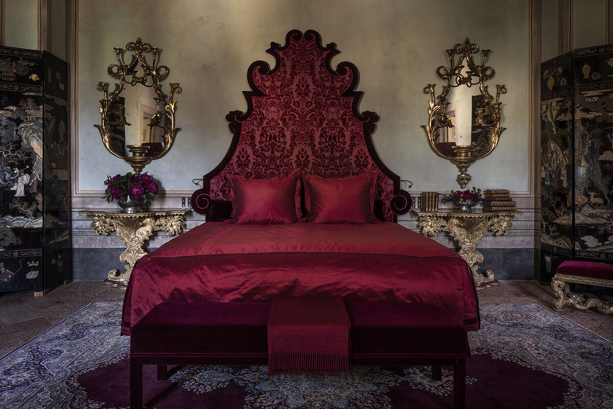 Villa Balbiano prestigious property on lake Como offering luxury accommodation red master suite ensuite bedroom chinese black lacquer coromandel screens bed best linen mirrors exquisite client service
