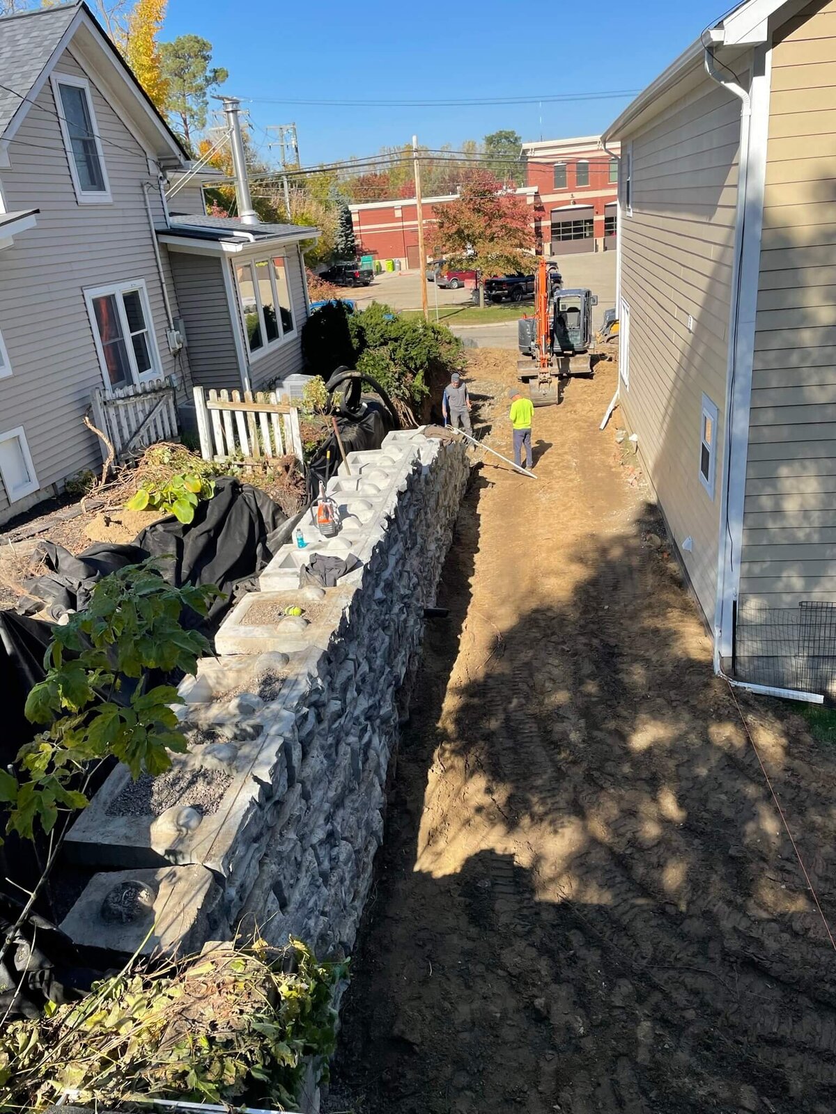 aerial-view-tight-driveway-retaining-wall-solution