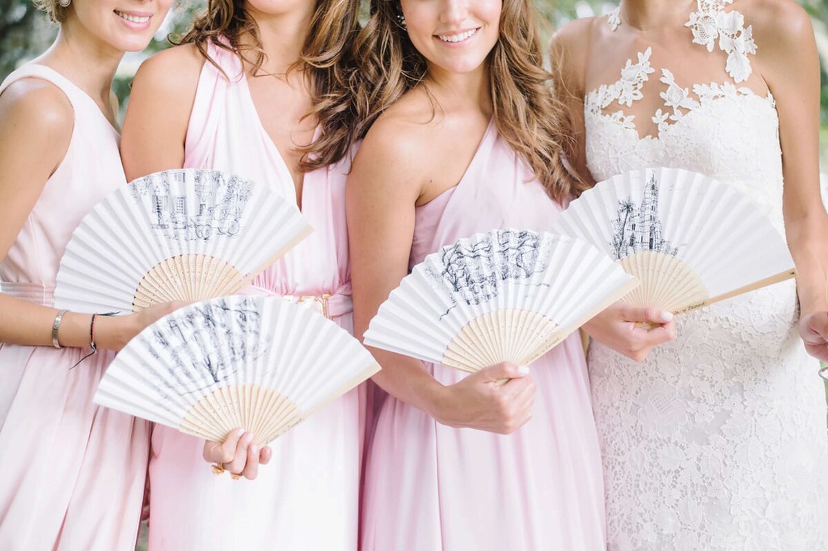 bridesmaids with fans