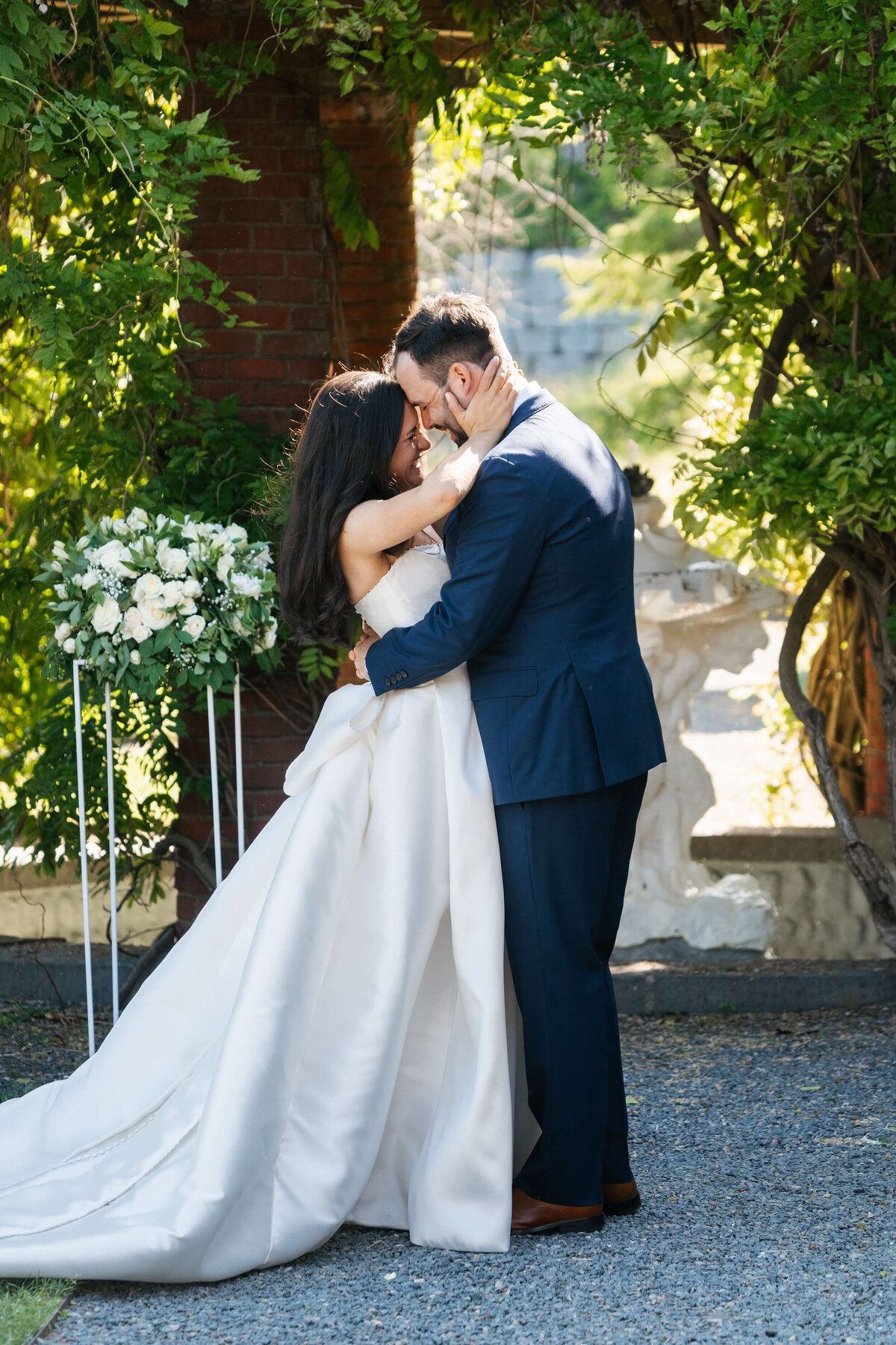 bride and groom embracing eachother after becoming husband and wife