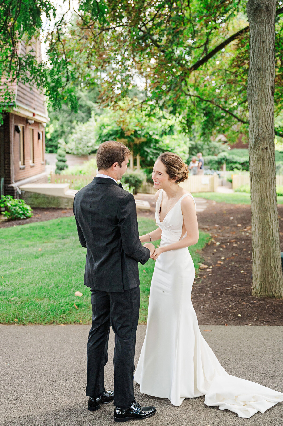 bride and groom happy on wedding day at the frick pittsburgh