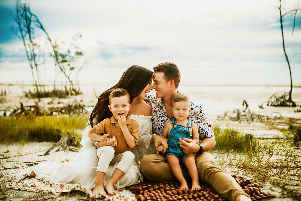 colorful boho vintage inspired family portraits at the beach in st pete fl