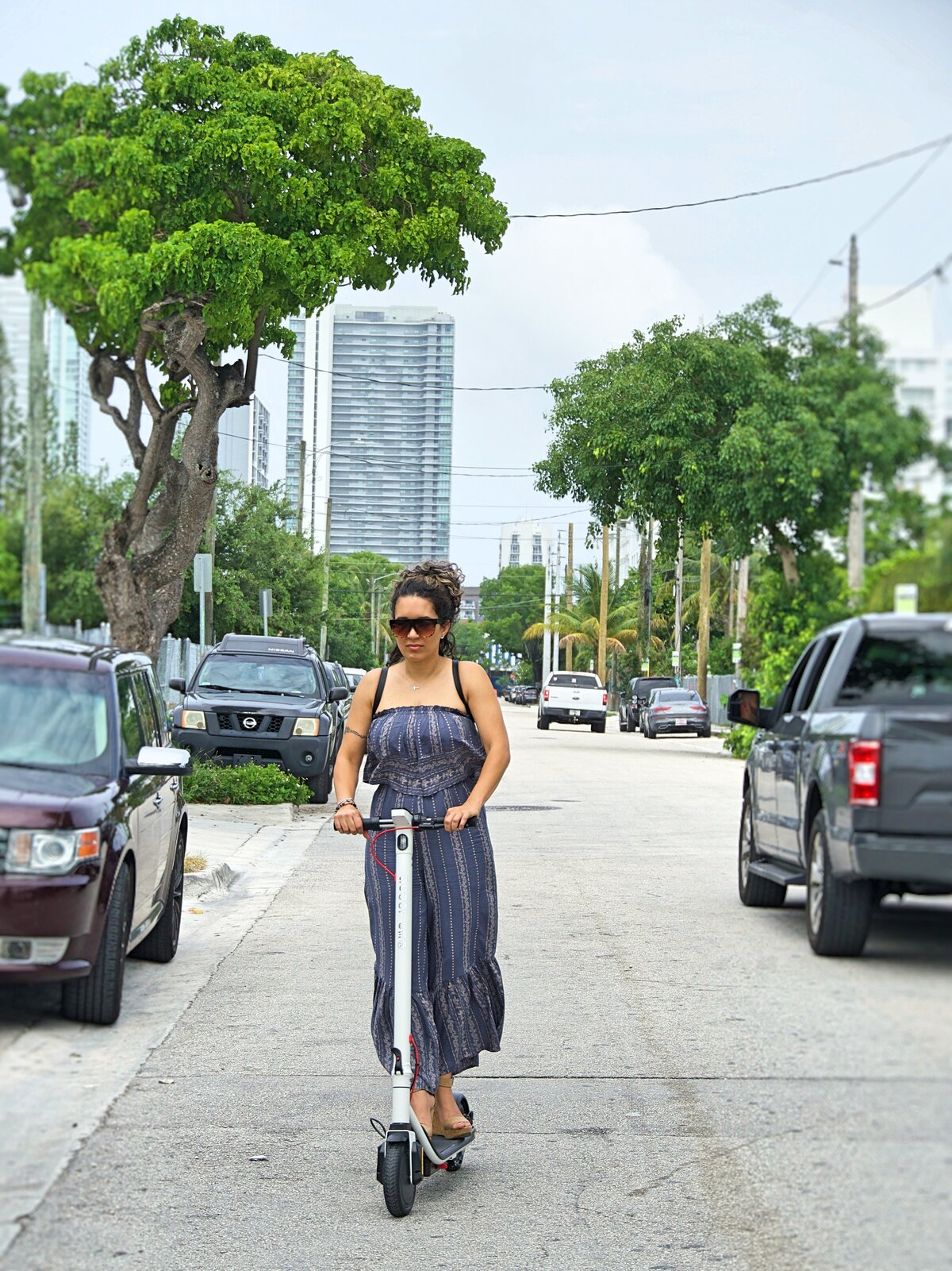 Lady riding Scoot E-3