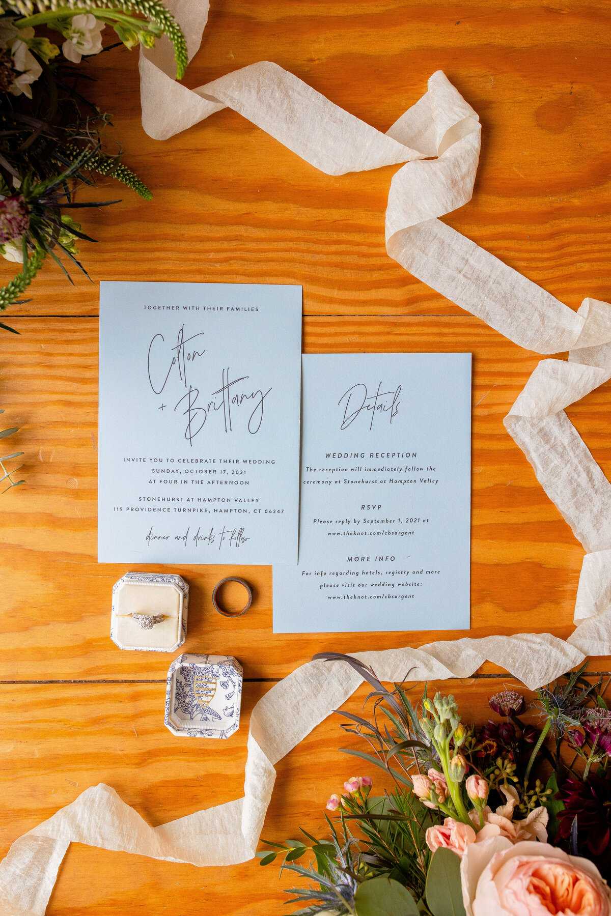Wedding invitation and Mrs. Box jewelry wedding details.