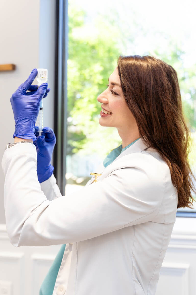 action shot of a medical injector taken by a baltimore personal branding photographer