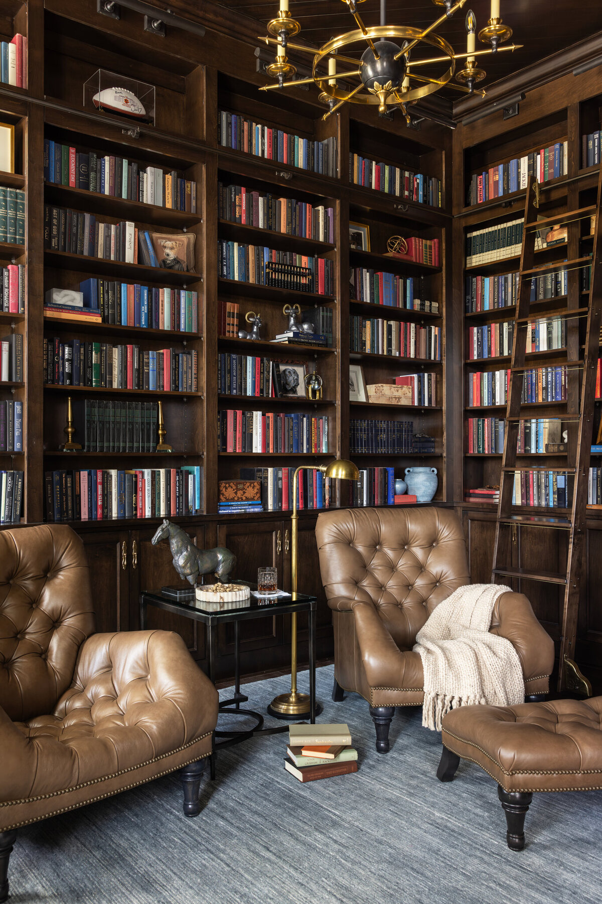 Moody_study_with_leather_chairs_and_walls_of_books