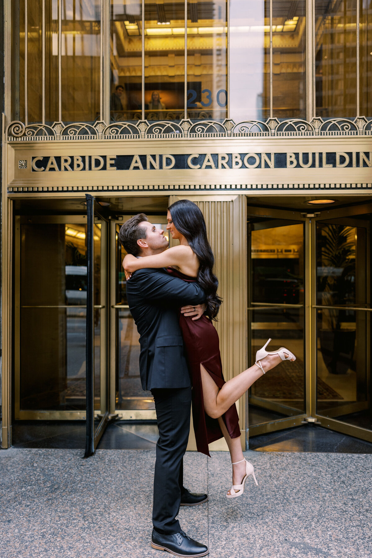 A couple poses inside the Pendry Chicago, capturing an intimate and stylish engagement session in the hotel’s elegant interiors.